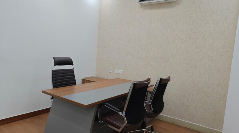 Small Manager Cabin with desk and seating arrangement Office Space