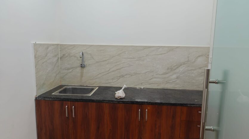 Office pantry area with kitchen setup